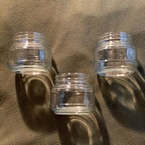 New Candle-lite clear glass candle holders. Set of 3. Approx 3 1/2” x 3 1/3”